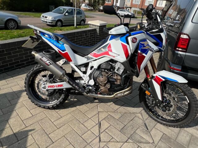Fitted a full titanium sc project exhaust to my Africa twin today don’t look to bad if I may say so my self 😃